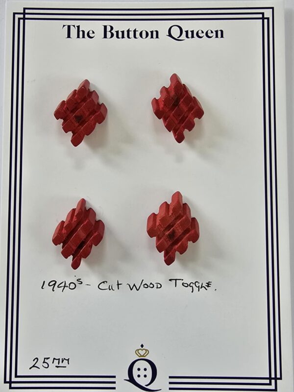 bd637e8d-9870-41f7-9877-828124c39a42 Red Cut Wood Toggle 1940's