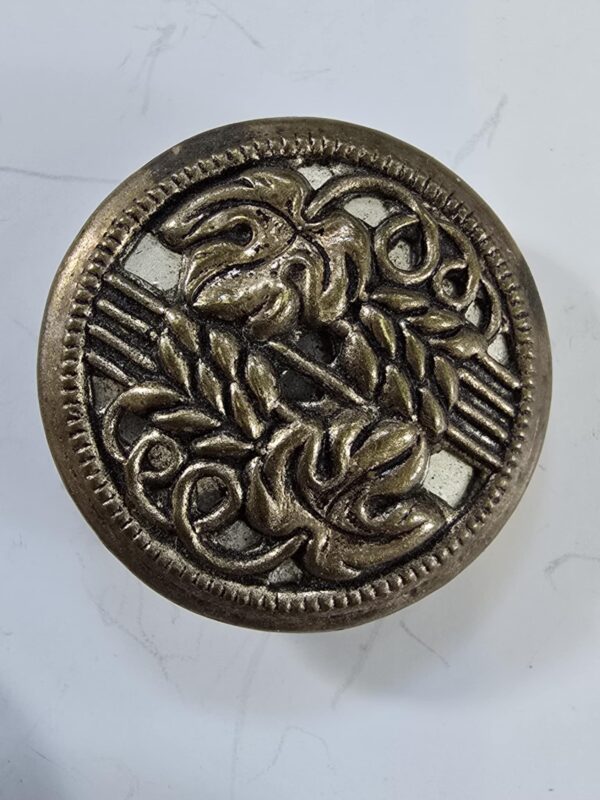 7133a48f-7f04-4a8b-a0f2-945112a9113d A set of Stamped Brass