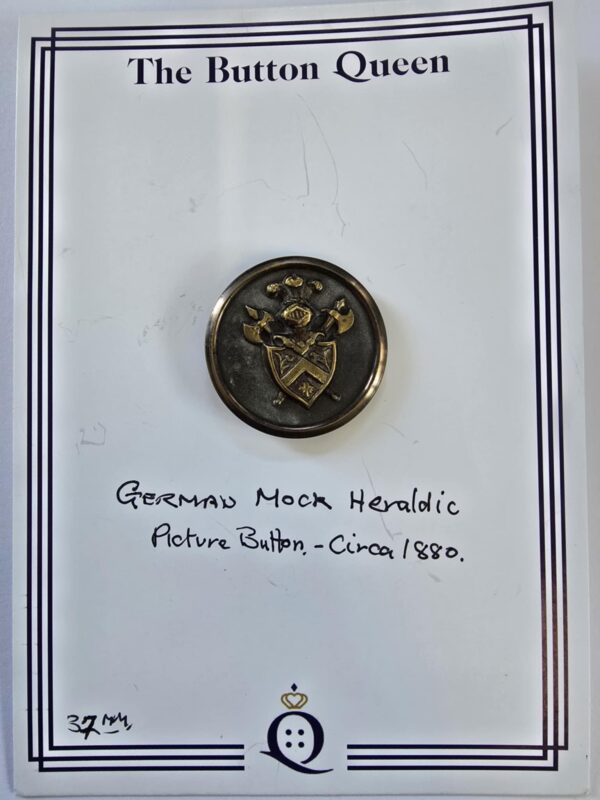 ad77c790-a8bc-4806-9d9c-2b045162b74e German Mock Heraldic Button