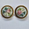 A pair of Porcelain in Brass Circa 1910 Buttons