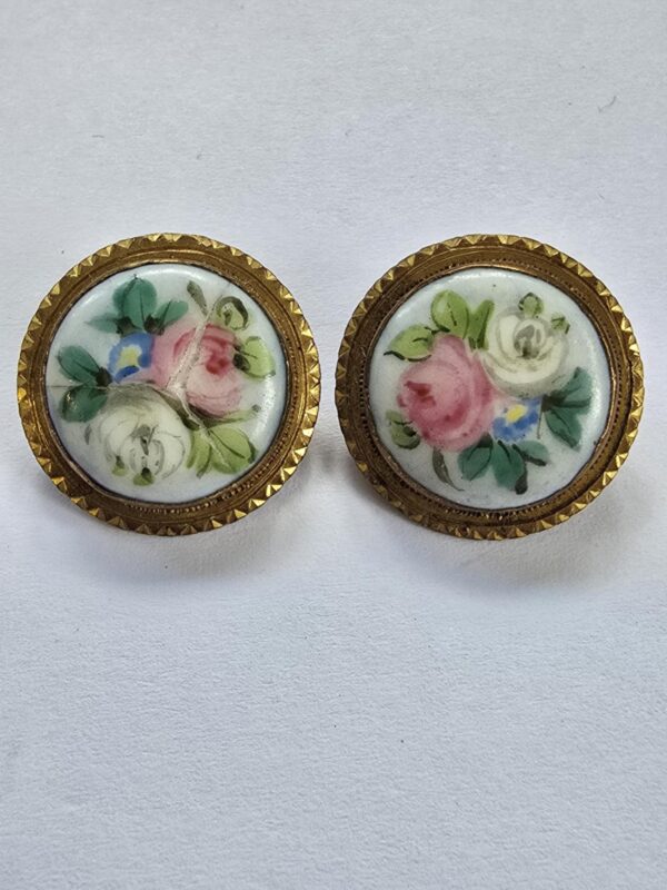 A pair of Porcelain in Brass Circa 1910 Buttons