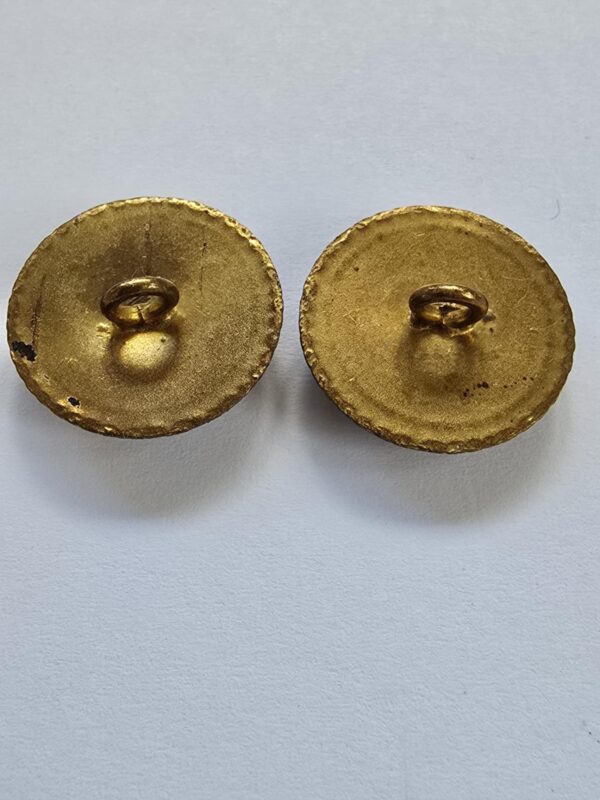 A pair of Porcelain in Brass Circa 1910 Buttons