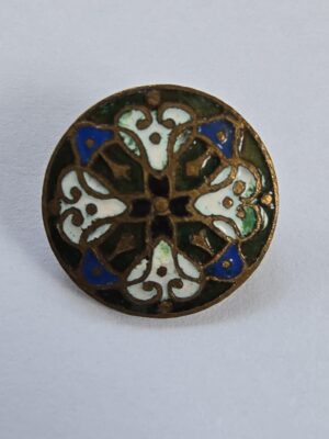 A set of Stamped Brass and Enamel Buttons
