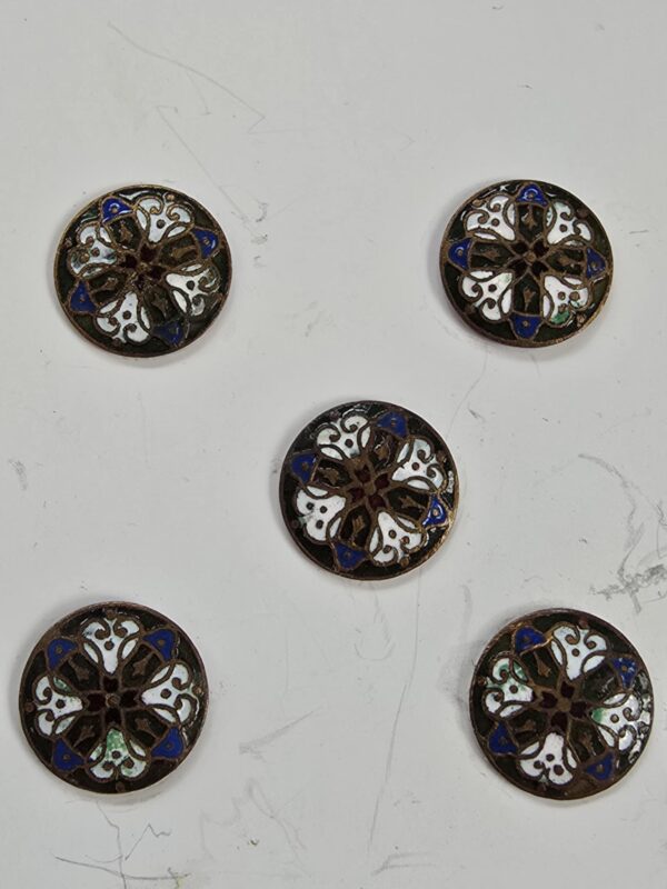 A set of Stamped Brass and Enamel Buttons