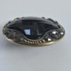 Black Glass with a Brass and Cut Steel Button