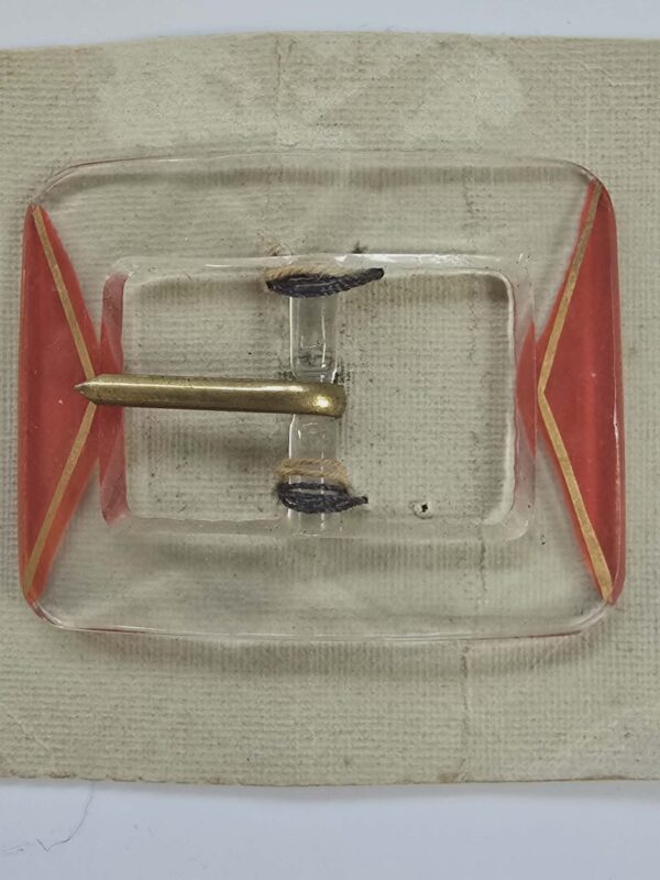 7721a812-cc06-4405-92e9-d9b348f8b6fc Clear Glass and Red Triangle Feature