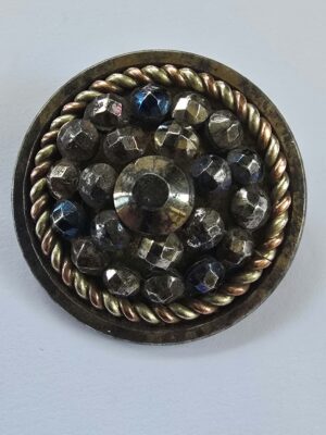 A Fine Steel Button