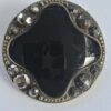 Black Glass with a Brass and Cut Steel Button