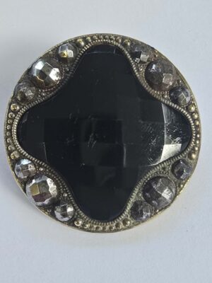Black Glass with a Brass and Cut Steel Button