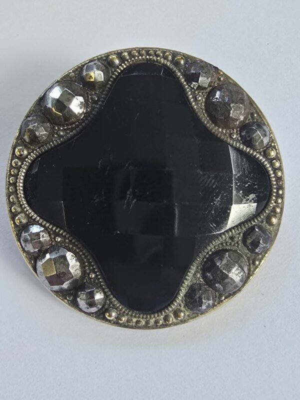 Black Glass with a Brass and Cut Steel Button