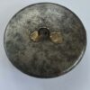 f06850d7-716e-456a-bcc5-614664e5356b A Fine Steel Button