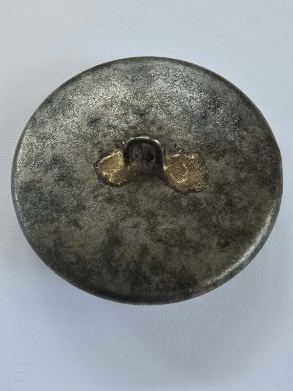 f06850d7-716e-456a-bcc5-614664e5356b A Fine Steel Button