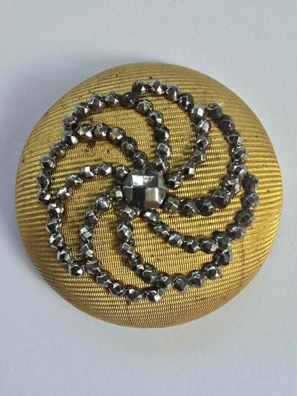 Stamped Steel on Brass Button