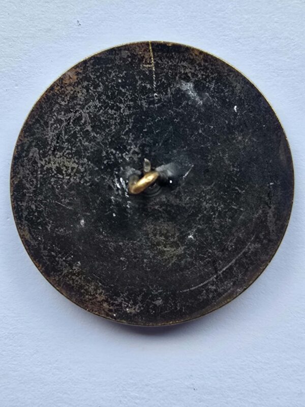 A Set of Cut Steel Mounted on Brass
