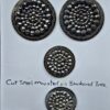 A Set of Cut Steel Mounted on Brass