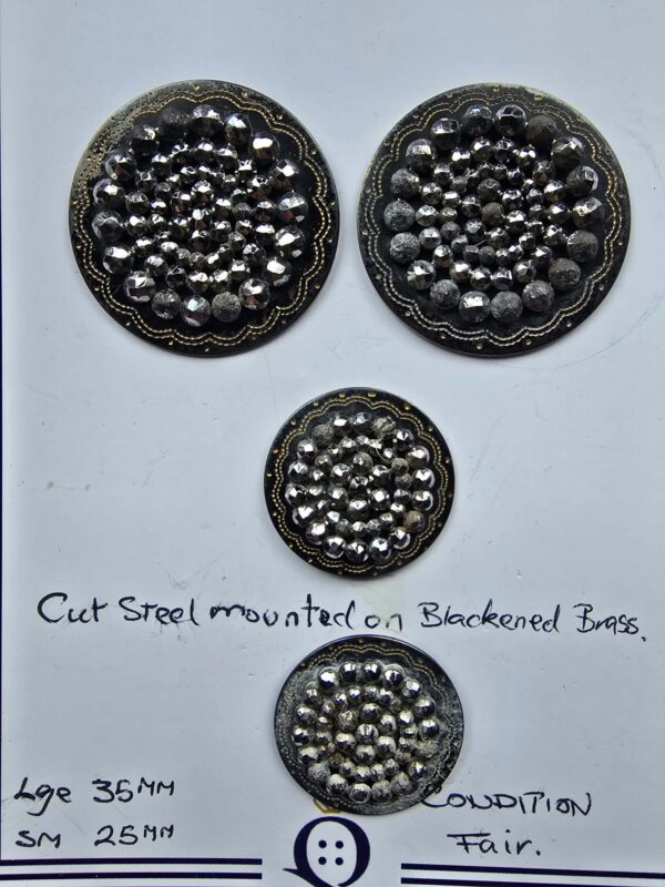 A Set of Cut Steel Mounted on Brass